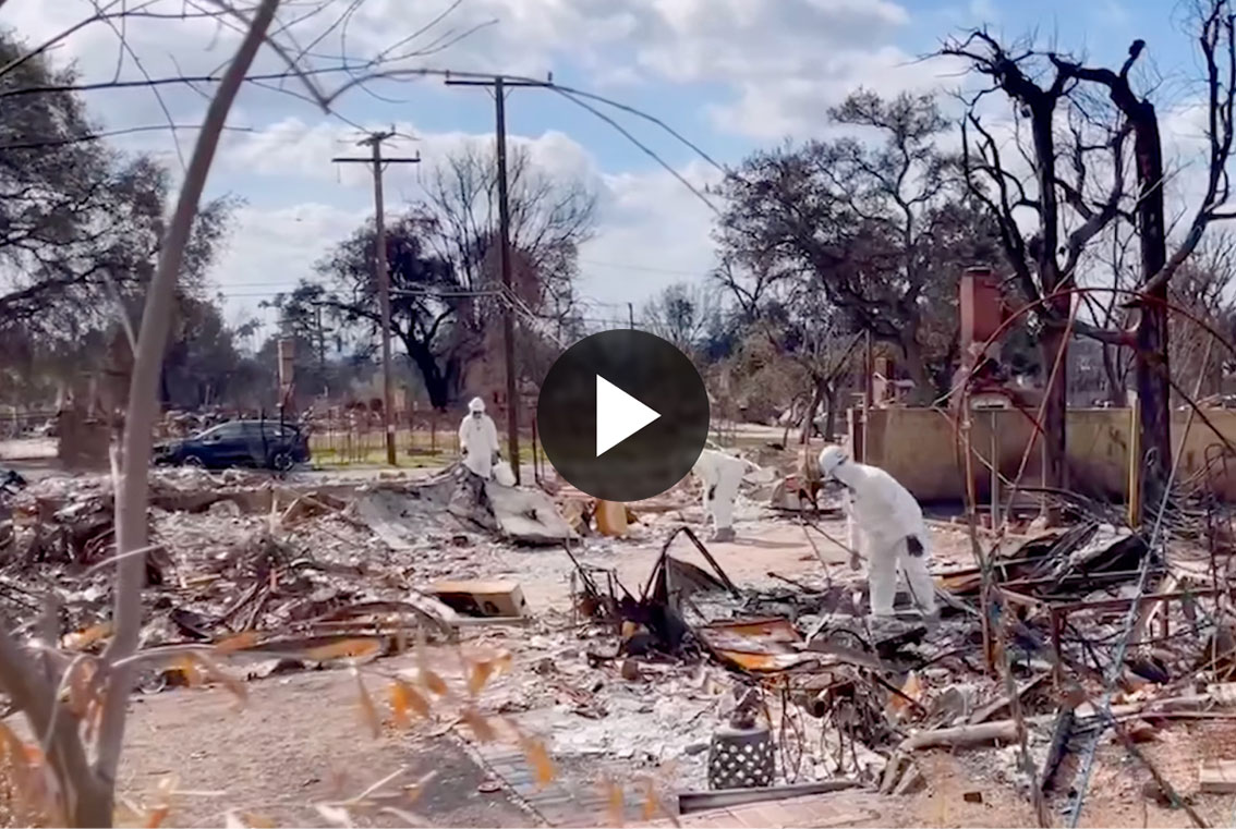 Burned trees and residual structure and debris